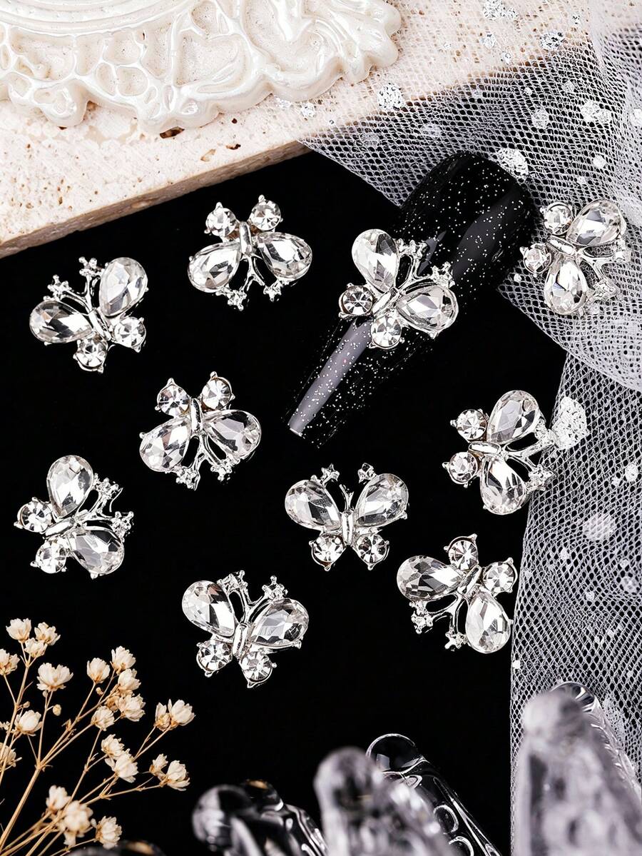 10pcs Of New Charming Silver Alloy Base Gemstone Rhinestone Butterfly Nail Decoration Design Accessories, Luxurious And Elegant Nail Accessories, Japanese And Korean Y2K Style Minimalist And Versatile Nail Art, Phone Case Products, Fragrance Free Handmade DIY Shiny Rhinestone Butterfly Accessories, Suitable For Multifunctional DIY Nail Accessories, Short Nails, French Nail Art, Duckbill Nail Art Products, Nail Gems, Nail Accessories. - Silver - View 1
