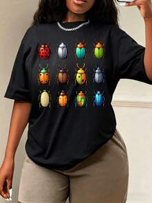 Camiseta Estampada para Mujer con Gráficos Coloridos de Escarabajo - Camiseta Casual de Manga Corta y Cuello Redondo, Corte Relajado para Todas las Estaciones, Perfecta para Uso Diario y Atuendos de Vacaciones, Combinada con Pantalones Beiges, Lavable aáquina, Estilo Moderno. - Negro - Ver 6