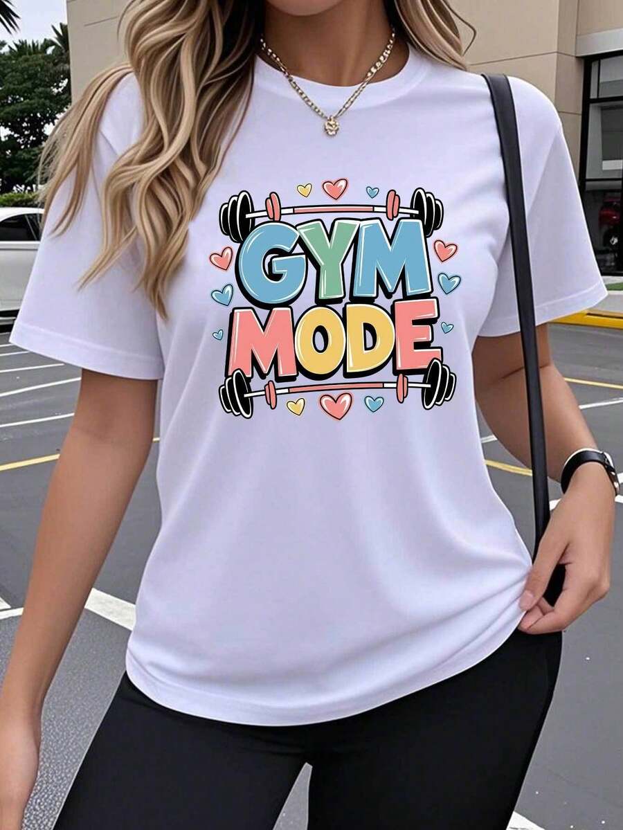 Camiseta de manga corta para mujer de una sola pieza, con un colorido diseño de letras GYM MODE, creatividad artística moderna y divertidos estampados populares. Top de cuello redondo, transpirable y elástico, cómodo para usar al aire libre en primavera, verano y otoño. Top de cuello redondo, estilo Y2K, lindo, holgado, casual y sencillo, de tela suave para un look moderno y actual, camiseta estampada transpirable y cómoda de color sólido, camiseta deportiva de manga corta, ropa deportiva casual para entrenamientos de fitness. - Blanco - Ver 1