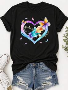 Camiseta Estampada para Mujer - Camiseta Casual Negra de Manga Corta y Cuello Redondo con Colorido Diseño de Mariposa en Forma de Corazón. Con un Corte Relajado para Todas las Estaciones, la Elección Perfecta Tanto para el Uso Diario como para tus Atuendos de Vacaciones (Lavable aáquina). - Negro - Ver 6