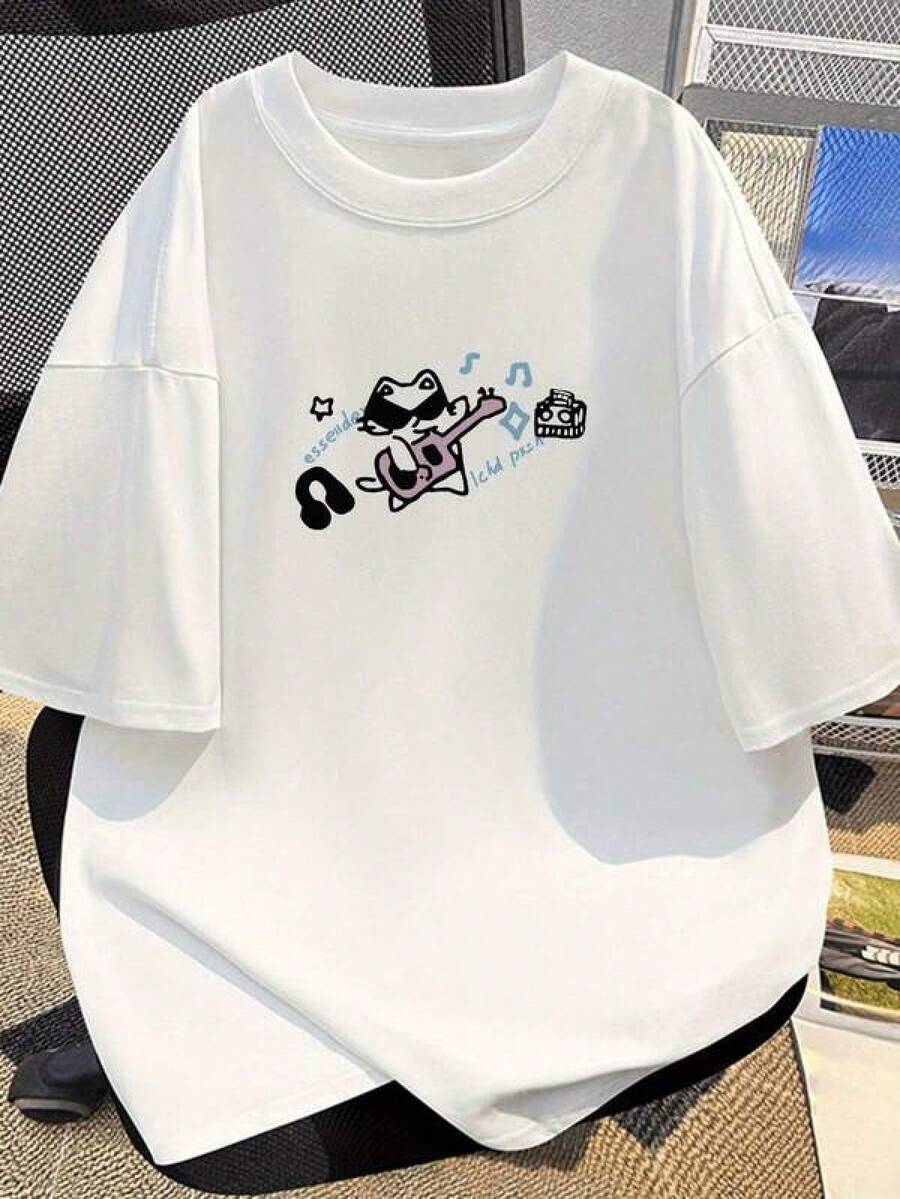Camiseta de manga corta% algodón, modelo nuevo 2026, para parejas de hombres y mujeres.|   Adecuado para ropa de vacaciones y viajes|   Estilo fresco y natural|   Camiseta transpirable de cuello redondo adecuada para uso diario y para ir al trabajo.|   Estilo unisex|   Diseño de estampado moderno|   Ropa cómoda, transpirable, de estilo urbano, moderna, casual y versátil tanto para hombres como para mujeres. - Negro - Ver 1
