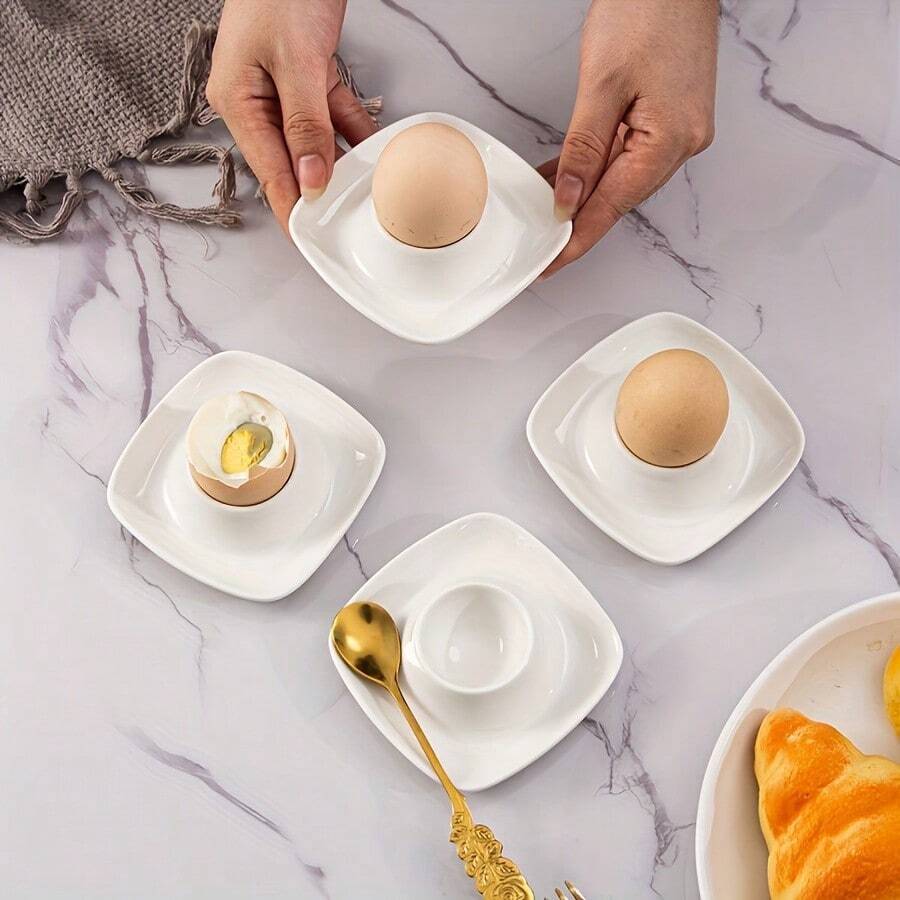 2/4Pcs Iridescent White Ceramic Egg Holders, Square Porcelain Egg Cups, Decorative Breakfast Egg Tray, Cute Egg Display Stand For Easter, Kitchen Tabletop Decor, Household Breakfast Tableware, Egg Serving Holder For Hard Boiled Eggs - White - View 1