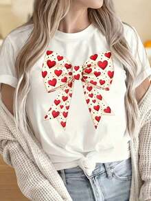 Camiseta de manga corta con cuello redondo para mujer, estampado de lazo de corazón, camiseta casual de manga corta para mujer, top lindo y a la moda para el Día de San Valentín, color blanco, estampado divertido para el Día de San Valentín, adecuada para fiestas de Navidad, actividades deportivas, salidas de vacaciones, citas, deportes, ocio diario, ocasiones de regalo de vacaciones. - Blanco - Ver 4
