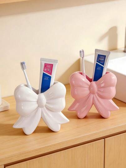 1 pieza Soporte para cepillo de dientes y pasta de dientes con lazo adorable, organizador de escritorio multifuncional para baño, organizador de brochas de maquillaje, taza para bolígrafos, accesorio de decoración del hogar