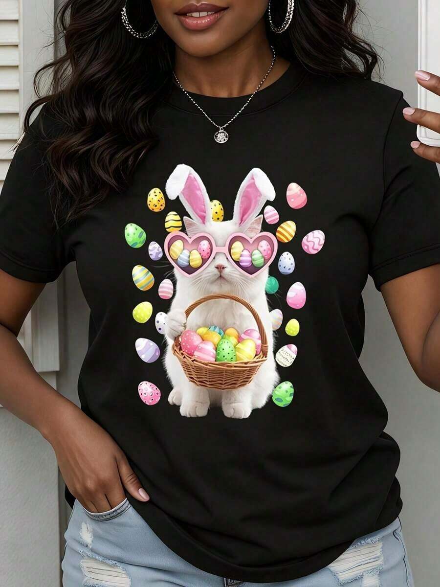 Camiseta con diseño de conejo de Pascua con gafas de sol en forma de corazón sosteniendo una canasta de huevos coloridos - Estilo vintage urbano unisex, de algodón 100%, manga corta, cuello redondo. - Negro - Ver 1