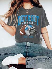 1 pieza de camiseta vintage con estampado gráfico de fútbol de Detroit, manga corta, cuello redondo, top casual para verano y primavera, ropa de mujer, 180g, 100% algodón. - Negro - Ver 6