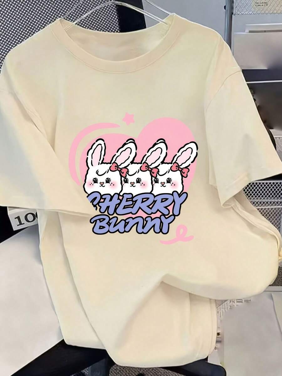 Camisa casual minimalista, nueva camiseta de manga corta con hombros caídos para mujer, estilo oversized, primavera/verano, camiseta blanca de manga corta con estampado de corazón de conejito y cerezas para el Día de San Valentín, estilo dulce y femenino, ropa urbana llamativa, top femenino y enérgico, blusas para mujer. - Albaricoque - Ver 1