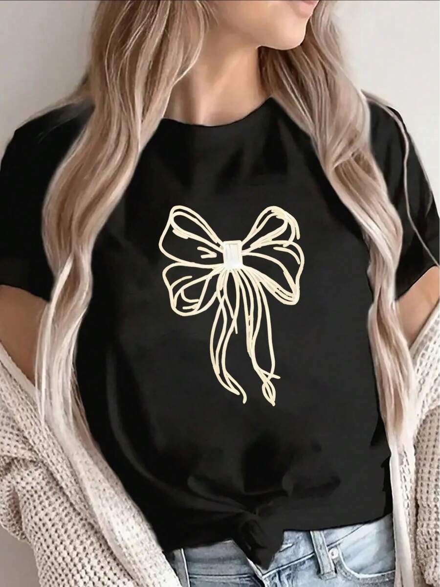 Camiseta Casual Elegante para Mujer con Estampado de Lazo Dorado y Manga Corta - Top de poliéster ligero y duradero con cuello redondo, negro con diseño de lazo beige, adecuada tanto para uso casual como formal, ideal para el hogar, la oficina o como invitada en una boda - Top versátil y resistente a las arrugas para todas las estaciones. - Negro - Ver 1