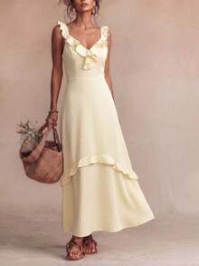 Vestido bohemio de estilo casual con cuello en V, volantes en el bajo y diseño acampanado en la cintura, adecuado para viajes, playa, jardín, fotografía callejera, festivales de música, fiestas y uso en verano - Amarillo - Ver 1