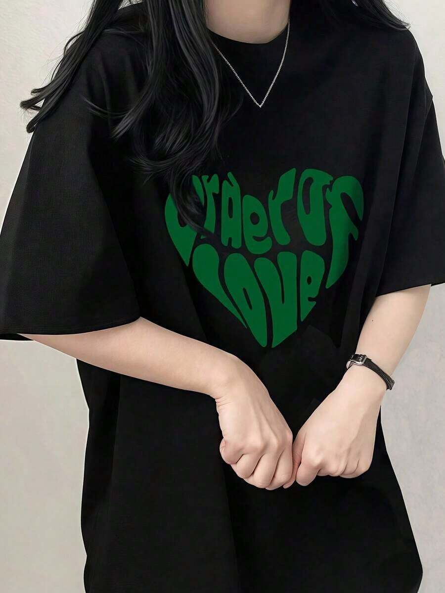 Camiseta Casual Minimalista con Estampado Gráfico, Camiseta Blanca Oversize de Inspiración Vintage para Mujer - Camiseta Casual de Verano con Estampado de Corazón Verde, Corte Holgado, Manga Corta, Transpirable y Cómoda para Atuendos Casuales, Camisetas Oversize 100% Algodón, Blusas para Mujer - Negro - Ver 1