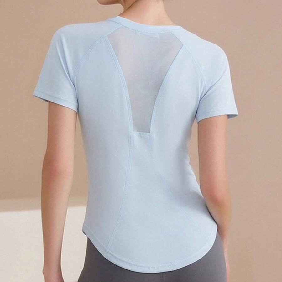 Nueva camiseta deportiva para mujer con espalda de malla, tejido elástico de efecto segunda piel, diseño estilizador para yoga y running - Azul - Ver 1
