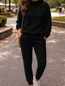 Set Of Pants And Turtleneck Sweater In Mousse Knit Fabric. - Black With Handle - View 2