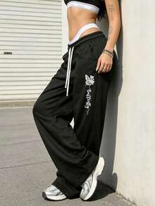 1 pieza Pantalón de chándal holgado de cintura con cordón para mujer, con bolsillos, de tela de punto con un ligero estiramiento, adecuado para ocio, correr, trotar, fitness - Negro - Ver 6