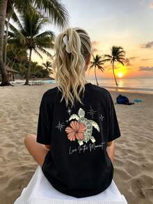 Nueva camiseta de cuello redondo de algodón puro para mujer, modelo 2026, ideal para el verano, con estampados de tortugas, flores y letras. Perfecta para vacaciones en la playa. - Negro - Ver 3