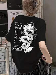 Camiseta única Y2K con diseño de dragón en blanco, estilo retro japonés, perfecta para los amantes de la moda urbana.Ideal para destacar en cualquier ocasión y expresar tu personalidad.Atrévete a ser diferente y marca  con esta pieza exclusiva. 099N - Negro - Ver 1