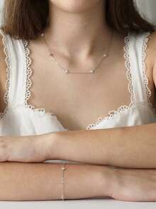 1 Set de collar y pulsera para mujer, estilo de capas delicado con borlas para vacaciones en la playa, pulsera y collar de joyería con trébol de cuatro hojas de cobre incrustado de circonita, accesorio diario como regalo - Plateado - Ver 4