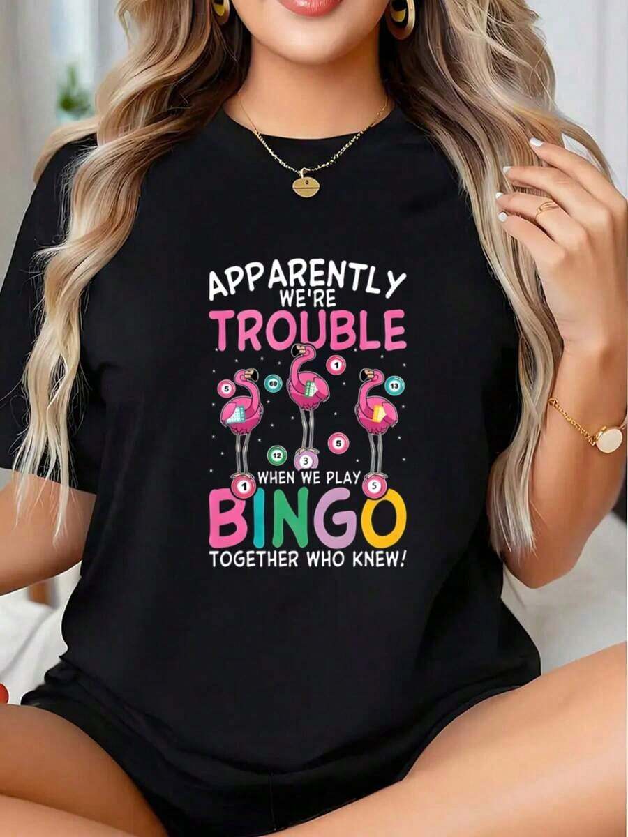 Al parecer, nos daban problemas cuando jugábamos al bingo juntos. ¿Quién hubiera imaginado? Camiseta gráfica con diseño de flamencos para mujer, atuendo divertido para fiestas, ropa casual, idea de regalo de cumpleaños - Estilo callejero vintage, unisex, holgada, de algodón, manga corta, cuello redondo, 100% algodón. - Negro - Ver 1