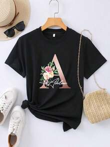 Productos Personalizados: Una Serie con la Letra A, Diseñcon el Texto de tu Elección. Diseños de Nombres Personalizados para Camisetas de Mujer Hechas de 100% Algodón Puro, ideales para fiestas. - Negro - Ver 1