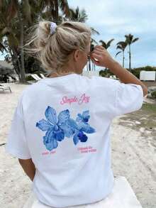 Esta camiseta de cuello redondo con estampado floral y letras coloridas para mujer es moderna y versátil.La camiseta gráfica viene en blanco y rosa, adecuada para usar en vacaciones.Verano Casual - Blanco 2 - Ver 6