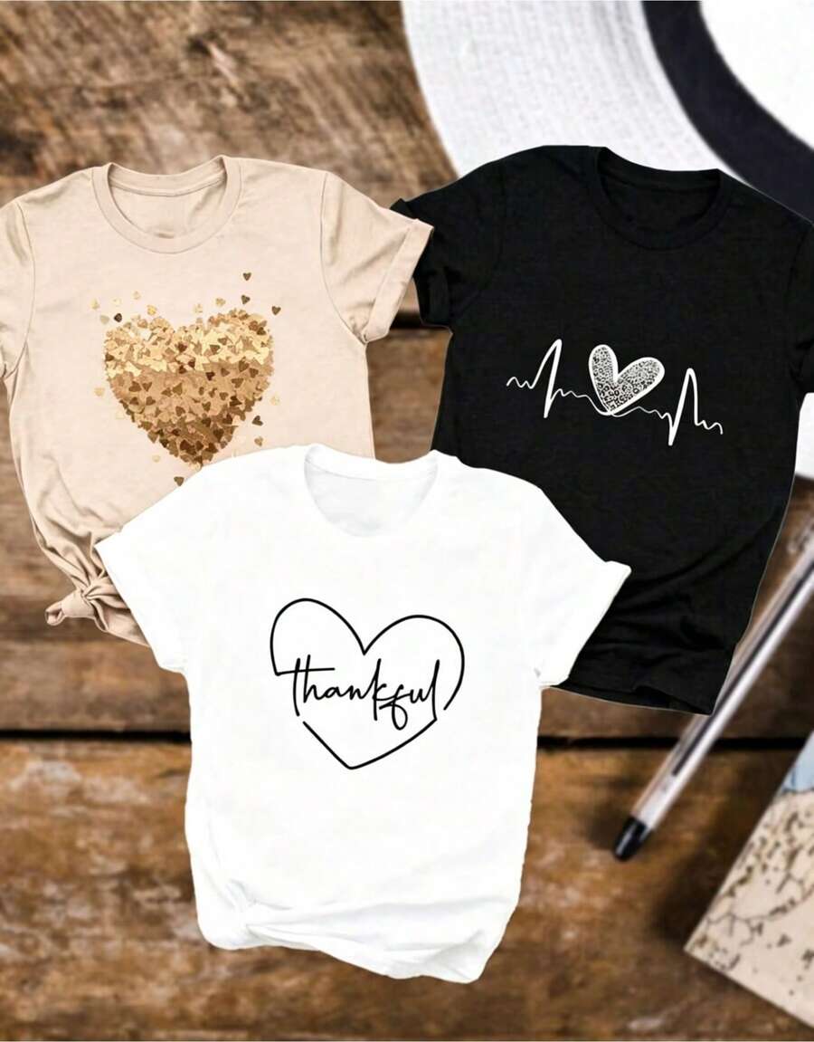 Nuevo modelo : Camiseta 3 casual streetwear, Top oversized cuello redondo daily outings, camping, concerts, hip-hop, rock, and rap events de manga corta para mujer, de una sola pieza, con estampado de hojas en forma de corazón, diseño de latidos del corazón, estampado de contorno de corazón de agradecimiento, cuello redondo, manga corta, de algodón puro, transpirable, estilo deportivo casual, ideal como regalo para las fiestas, diseño de mariposa primaveral. - Negro - Ver 1