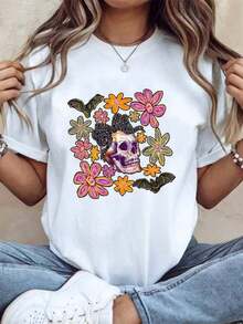 Suave, transpirable y ligero para comodidad durante todo el día. Camiseta de manga corta para mujer con estampado de calaveras y flores, estilo casual de verano. Tela cómoda, perfecta como regalo. 220g. Cuello redondo clásico con un corte relajado que favorece todas las formas del cuerpo y es fácil de combinar con jeans, shorts y leggings. - Blanco - Ver 12