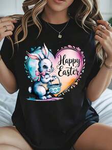 Camiseta Negra de Mujer con Diseño de Corazón de Conejo de Pascua y Cesta, Regalo Ideal para Amantes de la Pascua, Camiseta Casual de Manga Corta con Cuello Redondo y Estampado, Son Excelentes Regalos para Amigos y Familiares, Camisetas 100% Algodón, Diseño Juvenil y Moderno para Uso Diario. - Negro - Ver 1