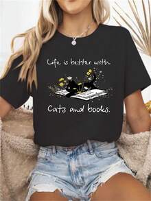 Nueva Camiseta Casual para Mujer 2026 con Estampado de Gatos y Libros - Diseño "La Vida es Mejor con Gatos y Libros", Cuello Redondo Suave y Elástico, Cómoda para Todas las Temporadas, Lavable a Máquina, Ideal para Uso Diario, Estilo Acogedor, Imprescindible para Amantes de los Libros, Tejido Cómodo y Transpirable. MUGY - Negro - Ver 1