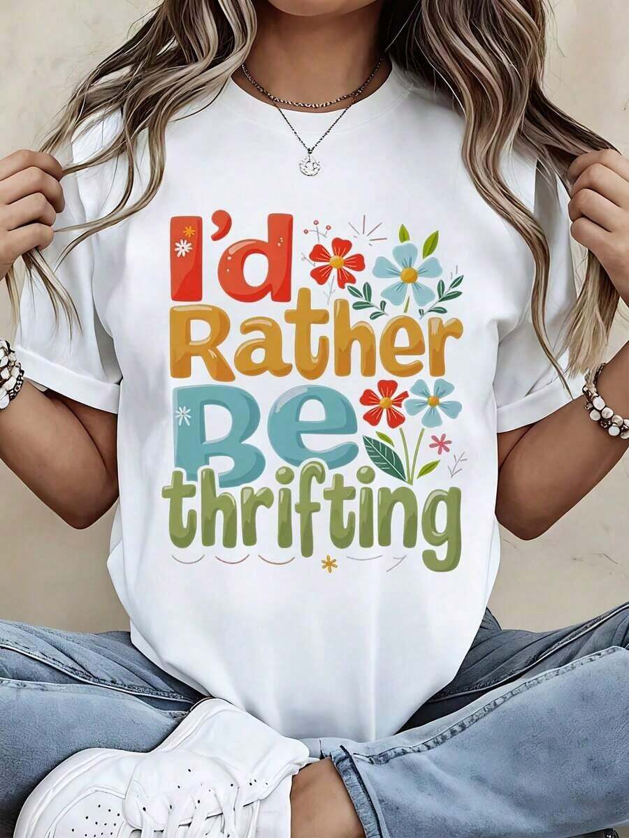 Camiseta Casual de Mujer, Corte Holgado, Cuello Redondo, Manga Corta, Estampado Floral con la Frase "I D Rather Be Thrifting", Ideal para Uso Diario y Salidas de Compras. - Blanco - Ver 1