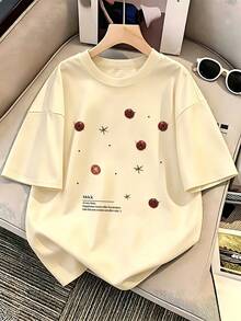Camiseta de manga corta de corte holgado con hombros caídos, con estampado de racimo de estrellas de tomate y frases en inglés, camiseta de cuello redondo de corte holgado, top único y moderno para mujer. - Albaricoque - Ver 1