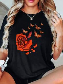 Ropa de talla para mujer, camiseta de talla para mujer con estampado floral negro - diseño de rosas rojo brillante y mariposas coloridas, mangas cortas de cuello redondo suaves y elásticas, top casual cómodo para todos los días y para todas las estaciones, camisa de tela suave apta para tallas grandes (base negra con diseño de rosas naranjas y mariposas coloridas) - Camiseta unisex de manga corta y cuello redondo de algodón suelto estilo vintage urbano. - Negro - Ver 1