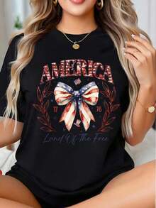 Camiseta Gráfica Patriótica "Tierra de la Libertad de América" con Lazo para Celebración del Día de la Independencia del 4 de Julio - Estilo Vintage Urbano Unisex, de Algodón 100%, Manga Corta, Cuello Redondo, Corte Holgado - Negro - Ver 7