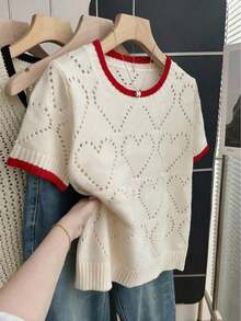 Blusa de punto holgada de cuello redondo y manga corta con diseño de corazón hueco y ribete de contraste en beige para mujer, suéter de manga corta para primavera/verano, últimas blusas de mujer, nuevas llegadas de blusas de punto para mujer - Albaricoque - Ver 1