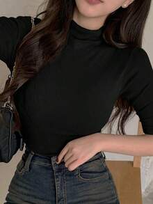 Camiseta de cuello alto ajustada de color liso para mujer - Negro - Ver 5