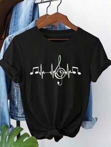 Camiseta de mujer, top casual estampado con un diseño de notas musicales y un latido del corazón sobre una pauta, mangas cortas deportivas, adecuada para uso diario informal y vacaciones. - Negro - Ver 1