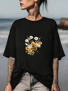 Camiseta de verano con estampado de abejas y flores, un regalo para ella, camiseta suave para mujer, top casual de verano, perfecta para salidas familiares, vacaciones y actividades de team-building. Top cómodo y versátil de manga corta. - Negro - Ver 1