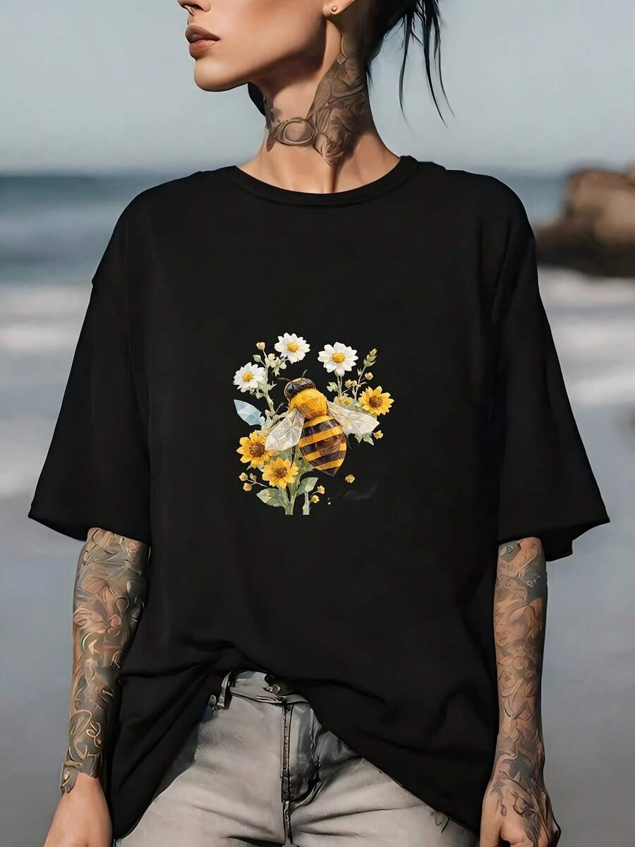 Camiseta de verano con estampado de abejas y flores, un regalo para ella, camiseta suave para mujer, top casual de verano, perfecta para salidas familiares, vacaciones y actividades de team-building. Top cómodo y versátil de manga corta. - Negro - Ver 1