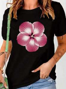 Camiseta elegante con estampado de flor exótica para mujer joven y audaz, perfecta para ocasiones casuales y verano, disponible en talla M y color negro, moda mujer,  en ropa urbana. - Negro - Ver 1