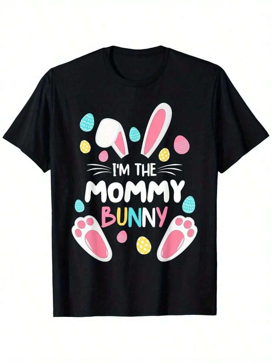 Camisetas a juego para la familia "Soy Mamá Conejita" de Pascua - Camisetas de manga corta y cuello redondo 100% algodón, estampadas con diseños festivos de conejitos y huevos de Pascua, perfectas como regalos para Pascua, Halloween, Día de Acción de Gracias, Navidad y Día de San Valentín para mujeres, familiares y amigos, convirtiéndolas en prendas ideales para celebraciones de temporada. | Ropa a juego para padres e hijos | Camiseta de Algodón Cómoda - Negro - Ver 1