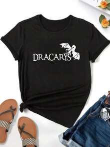 ComfortableCamiseta ligera para mujer DRACARYS con diseño de murciélago - Camiseta casual elástica de manga corta, con llamativos caracteres DRACARYS y un diseño de silueta de murciélago, cuello redondo transpirable adecuado para todas las estaciones, disponible en tallas S-XXL, perfecta para el uso diario, estampado elegante, ajuste cómodo, estilo urbano, diseño sencillo, camiseta duradera y a la moda, 100% algodón. Camiseta de manga corta para mujer, estilo básico que combina con todo, para uso interior y exterior. - Negro - Ver 4