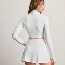 Yunuo Menswear Eassivo Eassivo Conjunto de top corto de manga larga y falda pantalón - Falda de talle alto con forma de A y pantalón corto incorporado, top corto con abertura para el pulgar y cuello envolvente, de secado rápido y estiramiento en cuatro direcciones para tenis y yoga, Conjunto de 2 piezas negro, falda y top, Conjunto de 2 piezas para mujer, Conjunto de falda y top corto negro, Conjunto de 2 piezas de verano para mujer - Verde - Ver 3