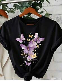 1 pieza de camiseta blanca para mujer con estampado de mariposas moradas, cuello redondo, camiseta casual de algodón, tejido de punto de elasticidad media, corte regular para damas, ideal para primavera/verano/otoño. - Negro - Ver 11