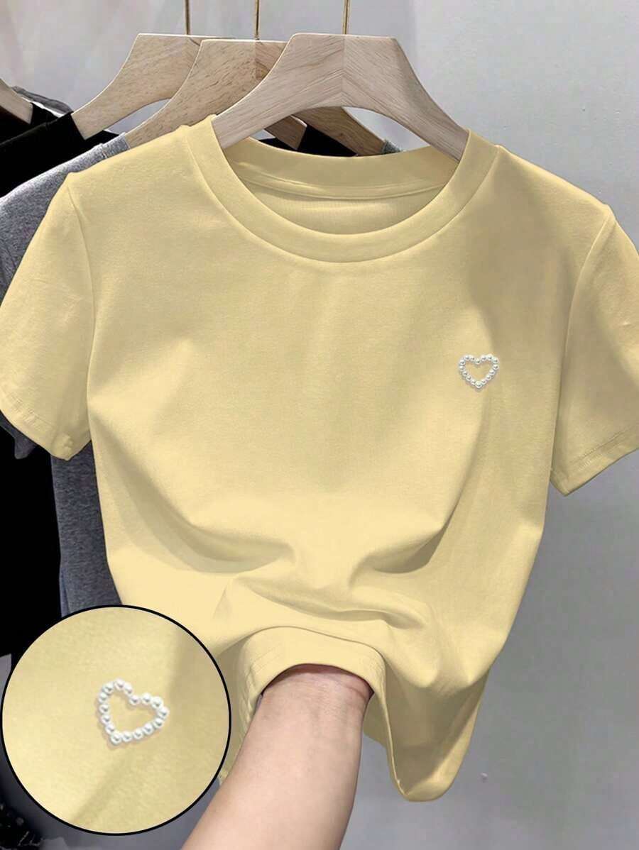 Camiseta de manga corta de unicolor con decoración de tachuelas en forma de corazón, de uso versátil y casual - Amarillo - Ver 1