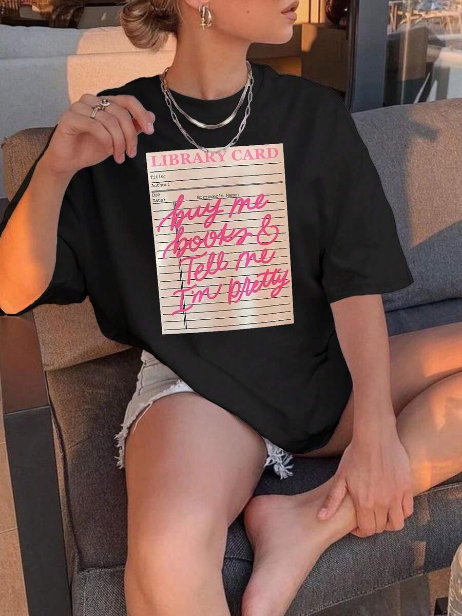 Tarjeta de biblioteca: Comprame un libro. Camiseta con Estampado "Entonces Complímétame por Mi Apariencia": Crea sin Esfuerzo un Look Dulce y Casual. Perfecto para el tiempo libre de verano. Desplazamientos Diarios. Salidas informales. ¡y Vacaciones! - alta calidad - Negro - Ver 1