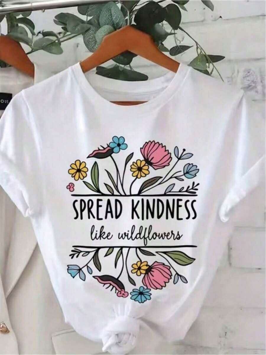 Camiseta casual para mujer, una blusa de manga corta para actividades diarias, con un estampado que dice "Flores Silvestres y Amabilidad Difundida", adecuada para usar en vacaciones. - Blanco - Ver 1