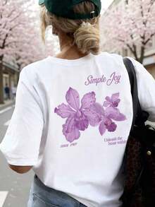 Esta camiseta de cuello redondo con estampado floral y letras coloridas para mujer es moderna y versátil.La camiseta gráfica viene en blanco y rosa, adecuada para usar en vacaciones.Verano Casual - Blanco - Ver 8