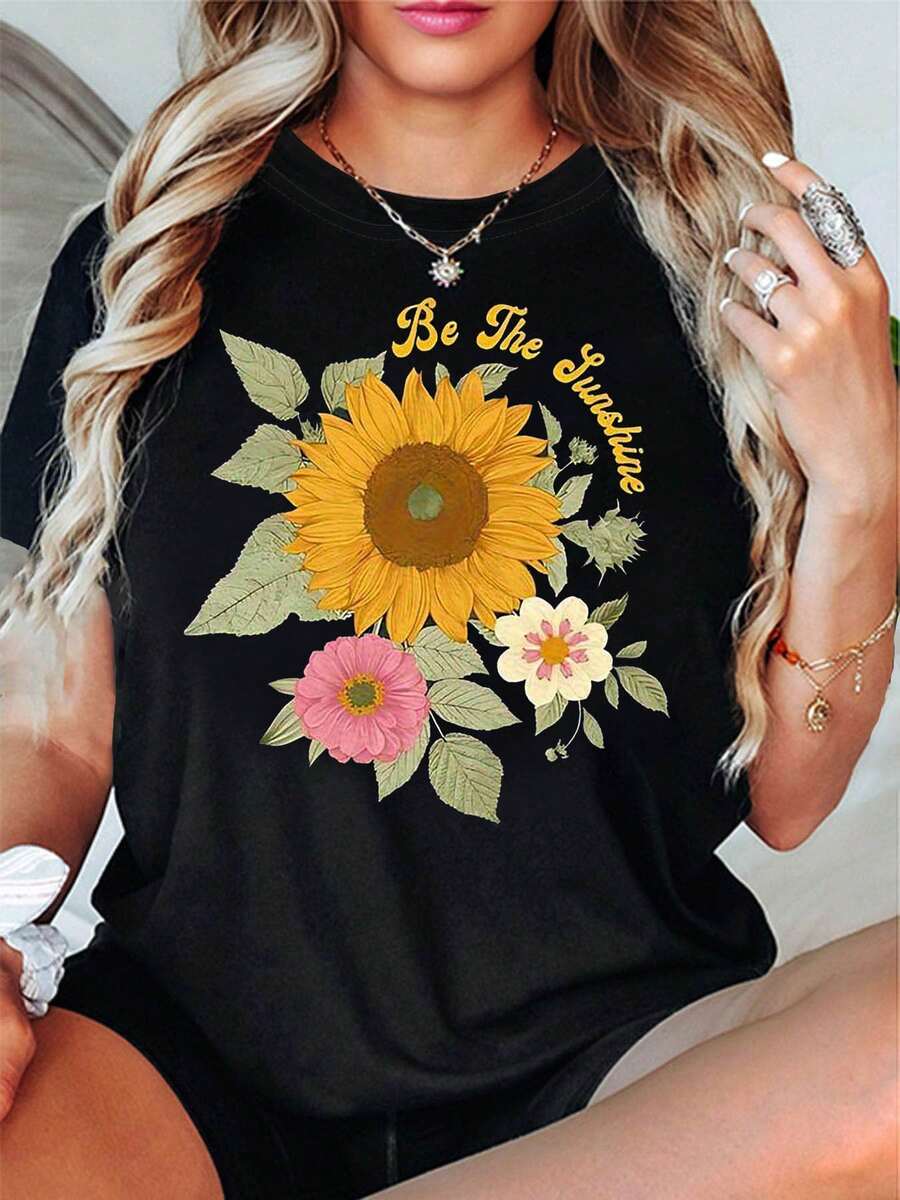 Camiseta de mujer "Be The Sunshine" con estampado floral de girasoles, camiseta de manga corta y cuello redondo para mujer, ropa casual de primavera/verano, uso diario, regalo para días festivos, atuendo para el Día de San Valentín, tops para mujer. - Negro - Ver 1