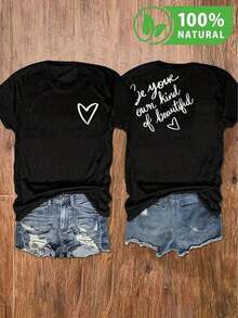 Camiseta negra con diseño de corazón y frase inspiradora, estilo urbano y casual para mujer en México, ideal para destacar tu personalidad única, perfecta para combinar con jeans o shorts, suave y cómoda para el día a día, última en moda femenina, ¡luce bella y auténtica! - Negro - Ver 1