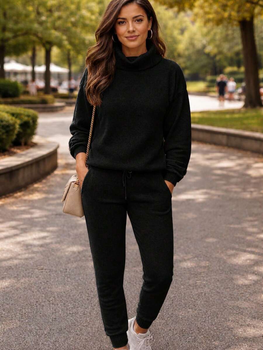 Set Of Pants And Turtleneck Sweater In Mousse Knit Fabric. - Black With Handle - View 1