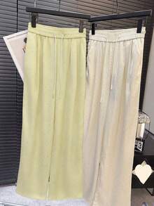 Pantalones rectos de cintura alta con goma elástica de satén, con brillos y anudado a la cintura - Amarillo - Ver 1