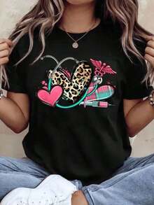 Camiseta con diseño de enfermera, corazón de leopardo, estetoscopio, caduceo médico, corazón rosa, jeringa y cuadros, para mujer, regalo para trabajadores de la salud, 220g - Estilo vintage urbano, unisex, holgada, de algodón, manga corta, cuello redondo, 100% algodón. - Negro - Ver 1